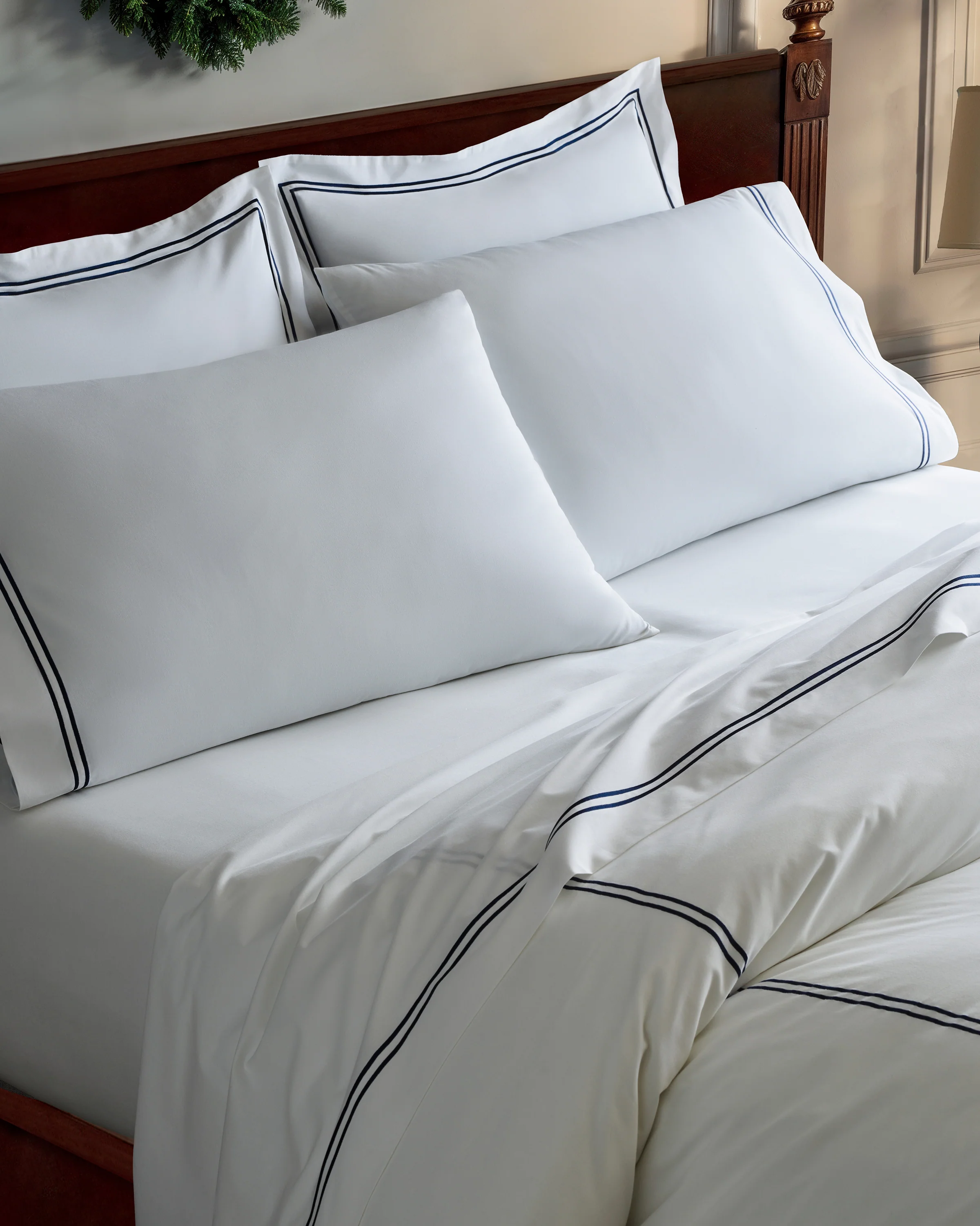 Luxe Premium Percale Bed Sheets in White with Navy Embroidered Border - Image 2